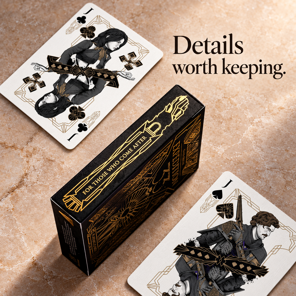 Black gold tuck box spine and two illustrated jack cards
